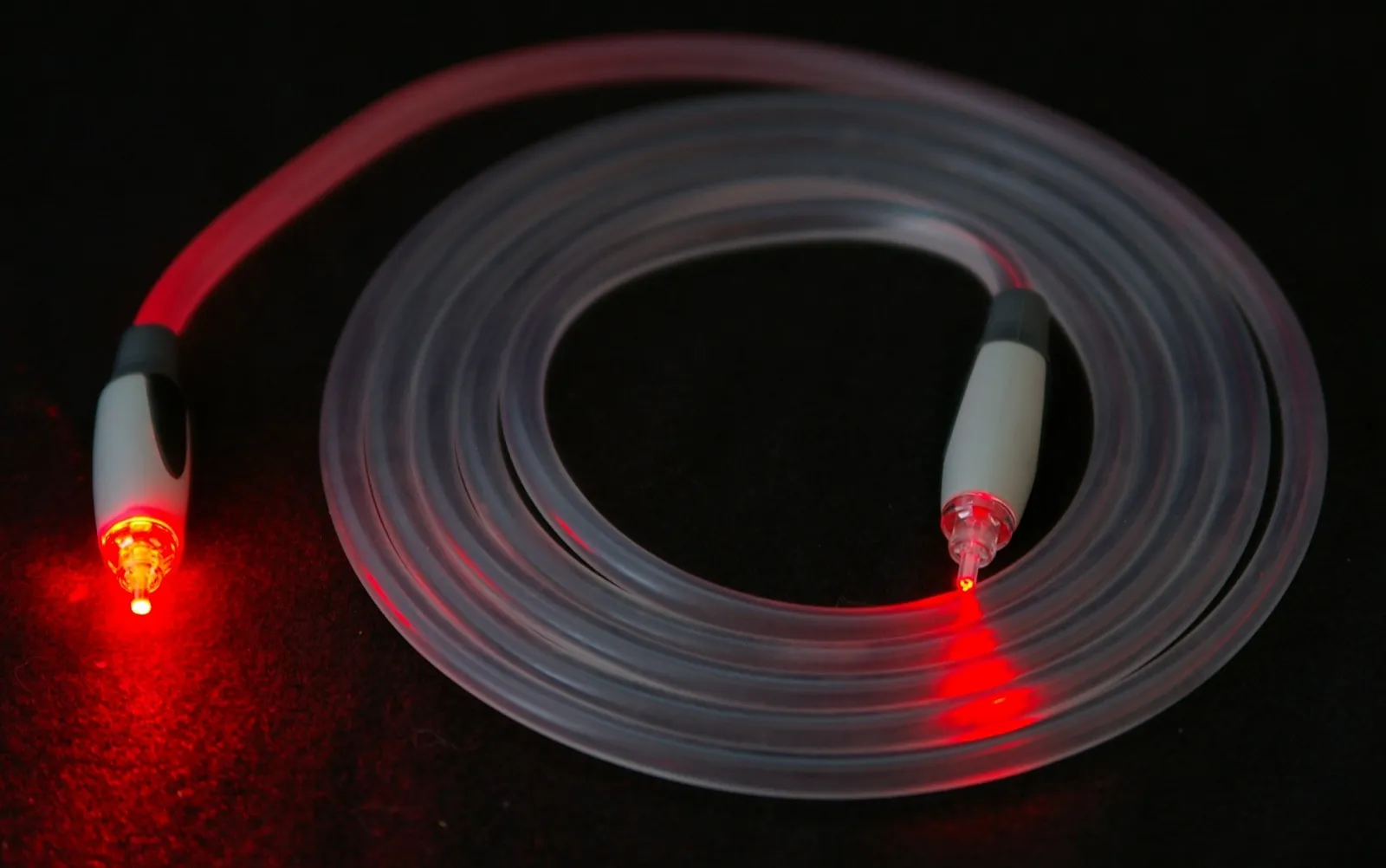 Illuminated fibre optic cables